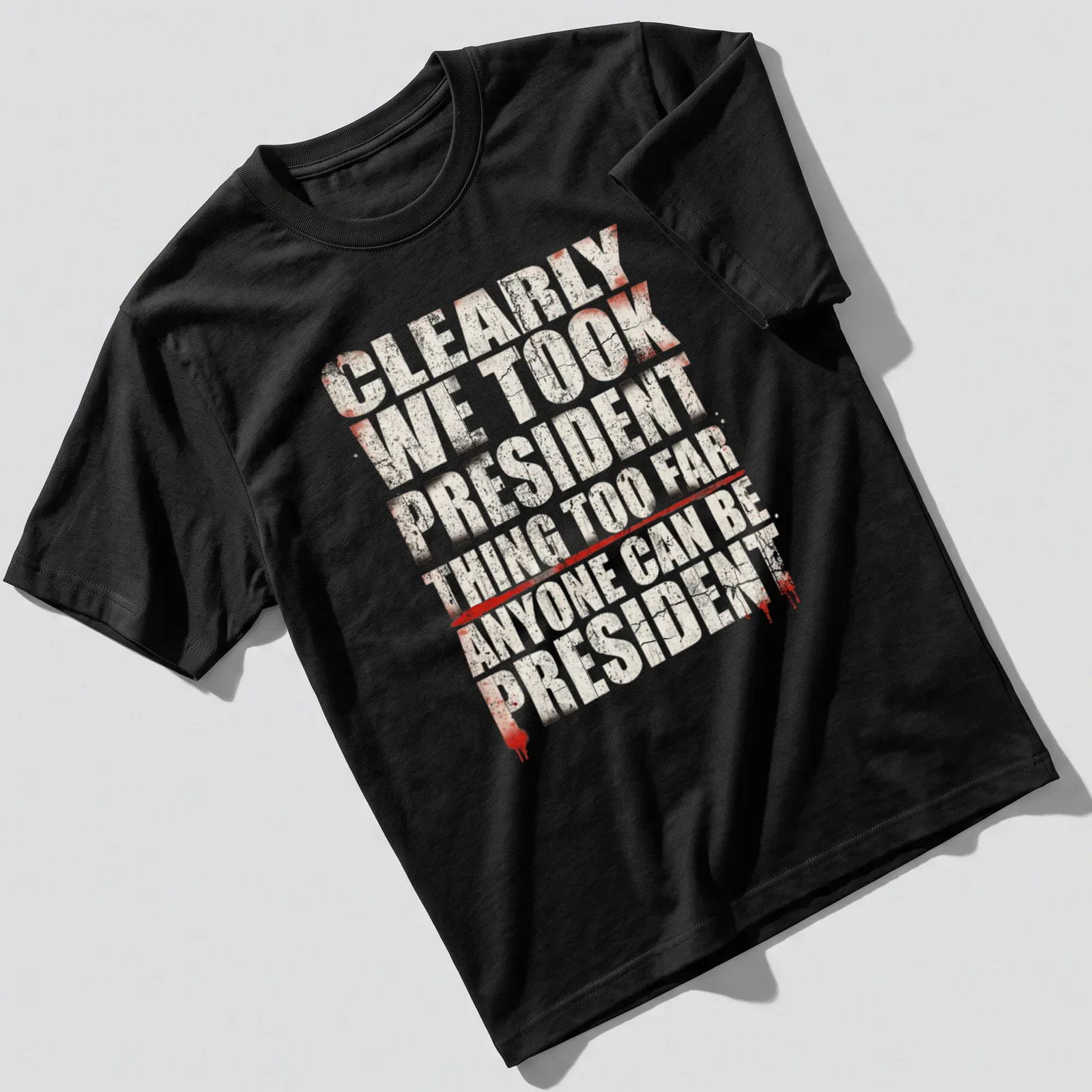 Grunge-style political humor t-shirt with bold text in red, white, and black — printed on a unisex t-shirt