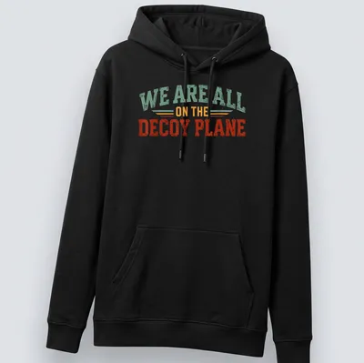 Retro distressed Political Humor t-shirt with bold text and colorful design — printed on a unisex hoodie