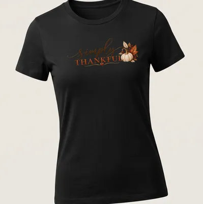 Elegant script 'simply THANKFUL' with pumpkins and autumn leaves design — printed on a women's shirt