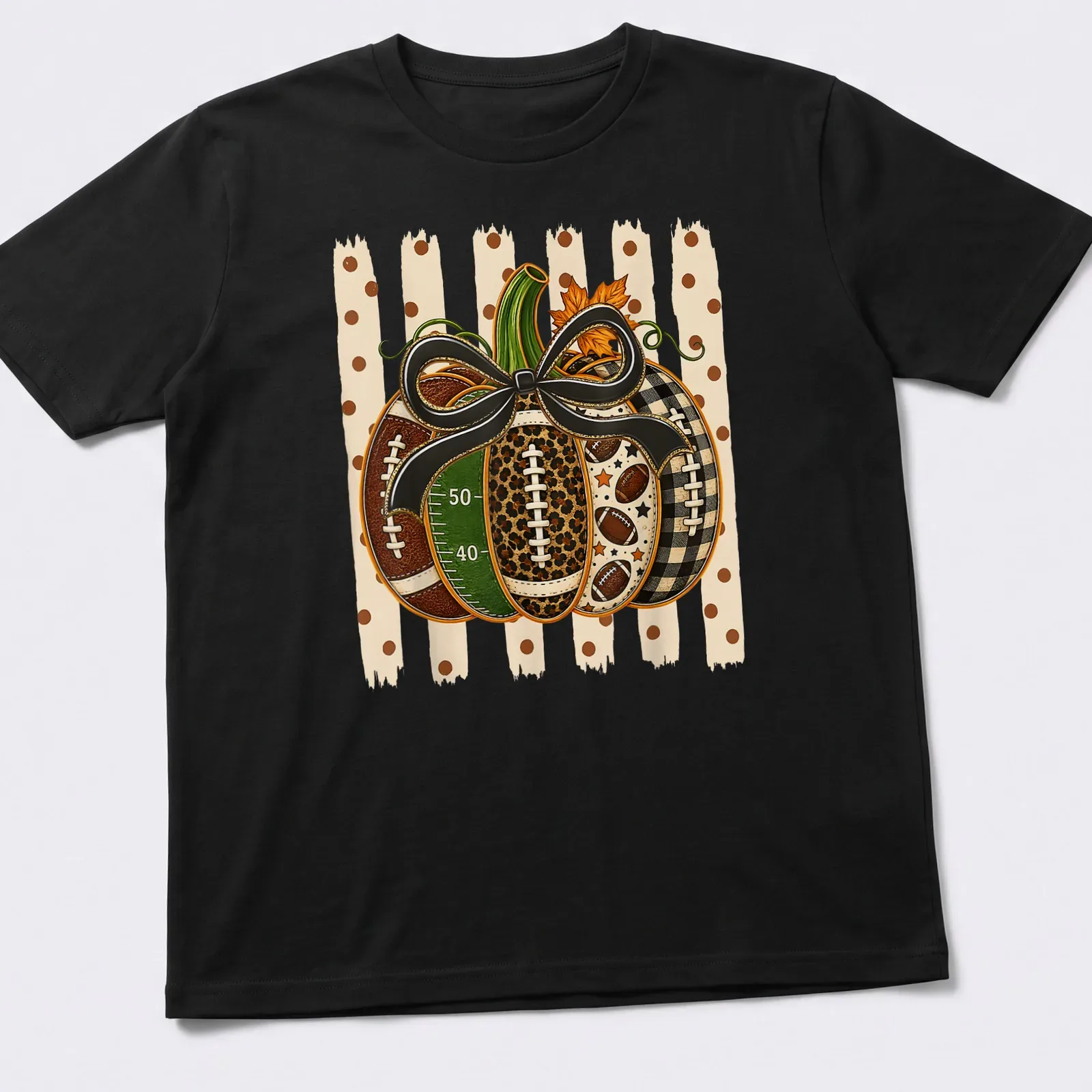 Colorful illustration of a pumpkin with footballs and bow in autumn hues — printed on a unisex t-shirt