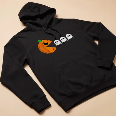 Cartoon design featuring playful pumpkins and ghosts for Halloween. — printed on a unisex hoodie