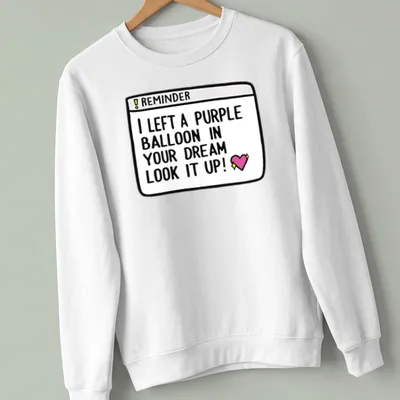 Cute T-shirt with a purple balloon and the quote about dreams. — printed on a unisex sweatshirt