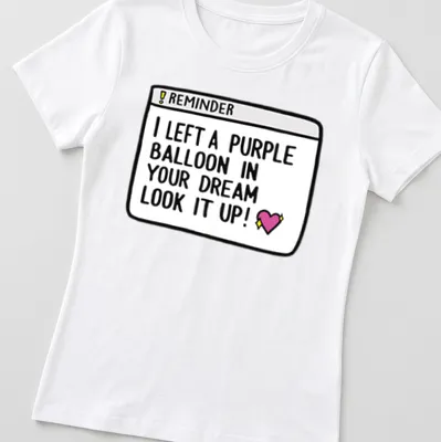 Cute T-shirt with a purple balloon and the quote about dreams. — printed on a women's shirt
