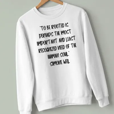 Handwritten Simone Weil quote about being rooted in black ink on white — printed on a unisex sweatshirt