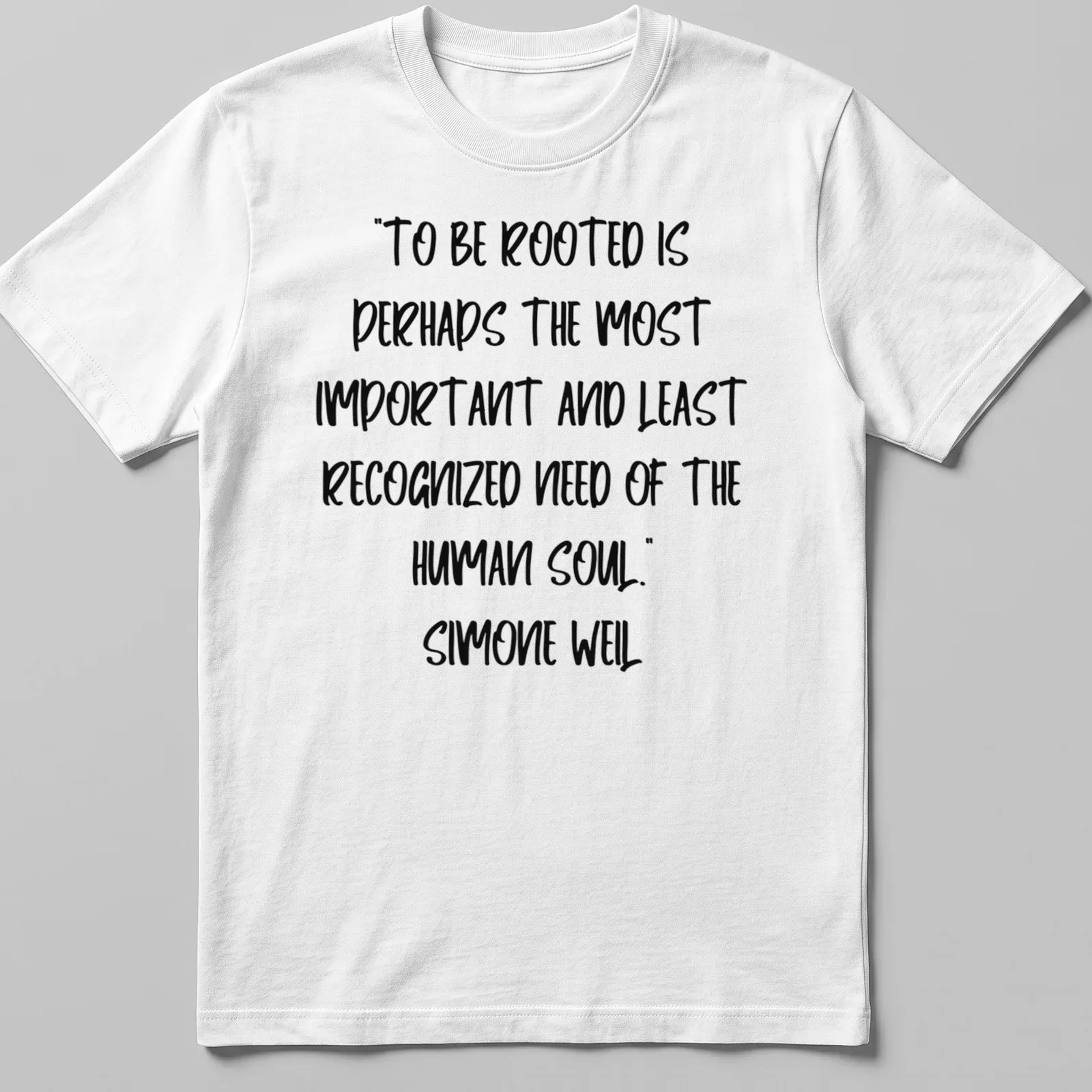 Handwritten Simone Weil quote about being rooted in black ink on white — printed on a unisex t-shirt