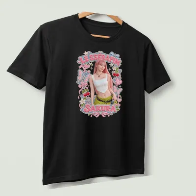 Colorful illustration of Sakura from LE SSERAFIM with playful summer accents — printed on a unisex t-shirt (angled view)