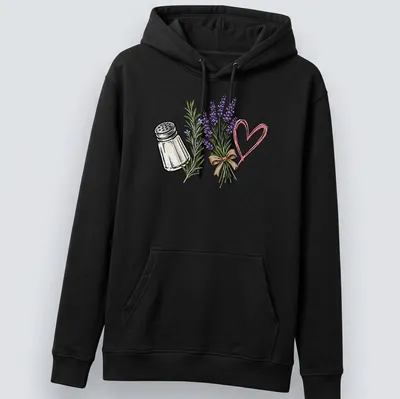 Illustrative T-shirt featuring a salt shaker and lavender flowers with a humorous quote about spilled salt. — printed on a unisex hoodie