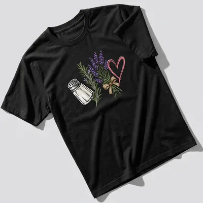 Illustrative T-shirt featuring a salt shaker and lavender flowers with a humorous quote about spilled salt. — printed on a unisex t-shirt