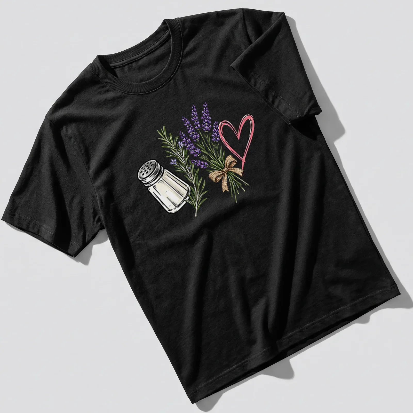 Illustrative T-shirt featuring a salt shaker and lavender flowers with a humorous quote about spilled salt. — printed on a unisex t-shirt