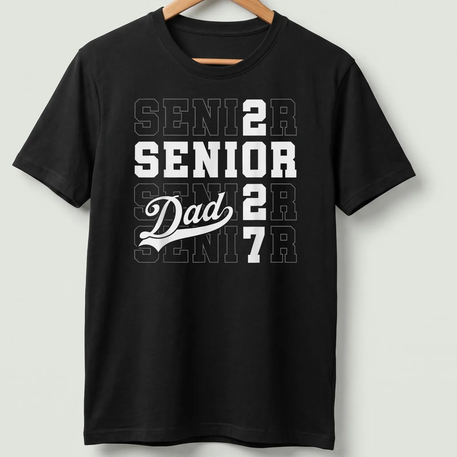 Bold typography Senior Dad shirt with graduation year 2027 — printed on a unisex t-shirt
