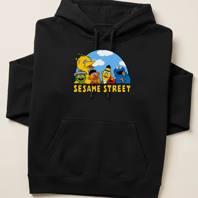 Cartoon print of Sesame Street characters surrounding the text SESAME STREET — printed on a unisex hoodie