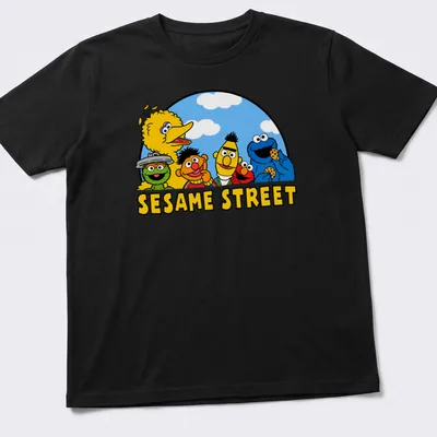 Cartoon print of Sesame Street characters surrounding the text SESAME STREET
