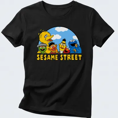 Cartoon print of Sesame Street characters surrounding the text SESAME STREET — printed on a women's shirt