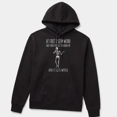 Playful cartoon skeleton t-shirt with humorous text about personality quirks — printed on a unisex hoodie
