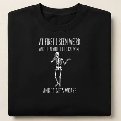 Playful cartoon skeleton t-shirt with humorous text about personality quirks — printed on a unisex sweatshirt