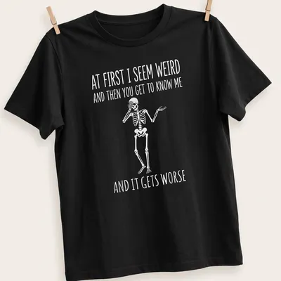 Playful cartoon skeleton t-shirt with humorous text about personality quirks — printed on a unisex t-shirt