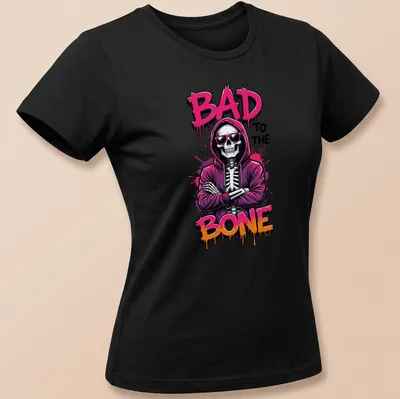 Bold graffiti-style t-shirt featuring a skeleton in a hoodie with colorful lettering. — printed on a women's shirt