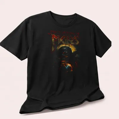 Vintage distressed tee featuring a skull and globe with band name above — printed on a unisex t-shirt (angled view)