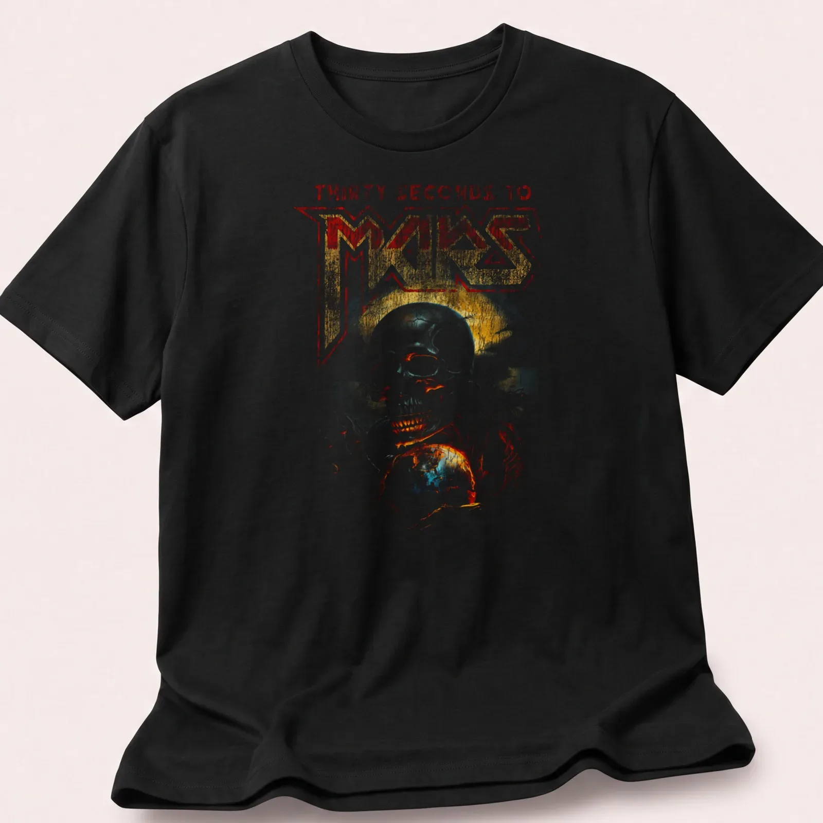 Vintage distressed tee featuring a skull and globe with band name above — printed on a unisex t-shirt