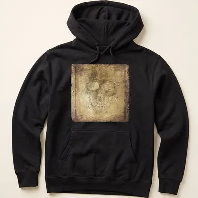 Faded gothic skull portrait t-shirt with ornate vignette in brown, beige, and black — printed on a unisex hoodie