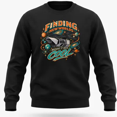 Vintage retro shirt featuring a space telescope and colorful text about finding new worlds — printed on a unisex sweatshirt