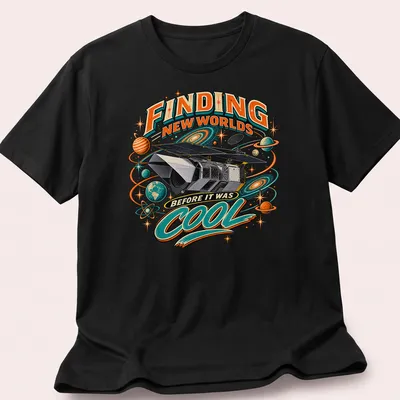 Vintage retro shirt featuring a space telescope and colorful text about finding new worlds