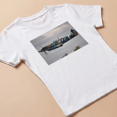 Photographic print of a Spitfire aircraft in flight with detailed colors — printed on a women's shirt