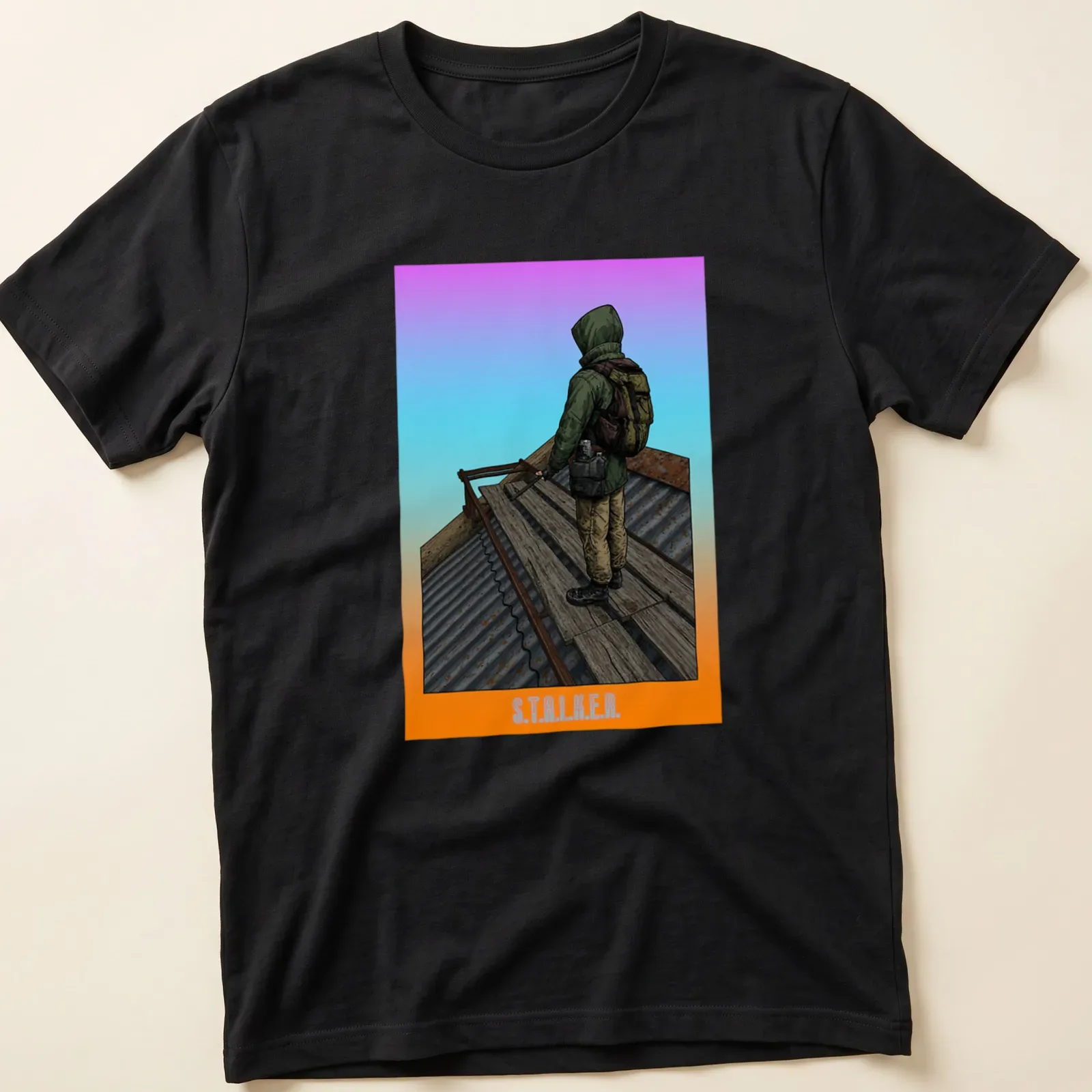 Detailed illustration of a stalker character with the text S.T.A.L.K.E.R. in purple, orange, and green — printed on a unisex t-shirt