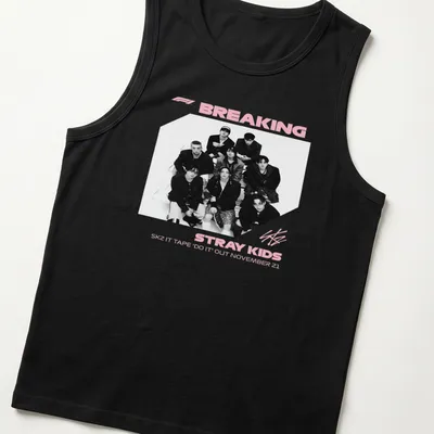 Monochrome shirt featuring Stray Kids graphic and text in black, white, and pink — printed on a tank top