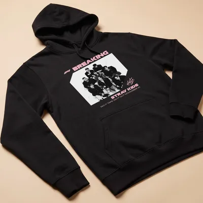 Monochrome shirt featuring Stray Kids graphic and text in black, white, and pink — printed on a unisex hoodie