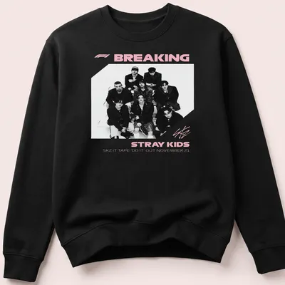 Monochrome shirt featuring Stray Kids graphic and text in black, white, and pink — printed on a unisex sweatshirt