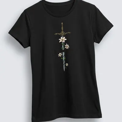 Illustrated sword with flowers and the phrase 'You do not yield.' in silver and gold tones. — printed on a women's shirt