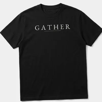 Minimalist Thanksgiving t-shirt with the word GATHER in white typography