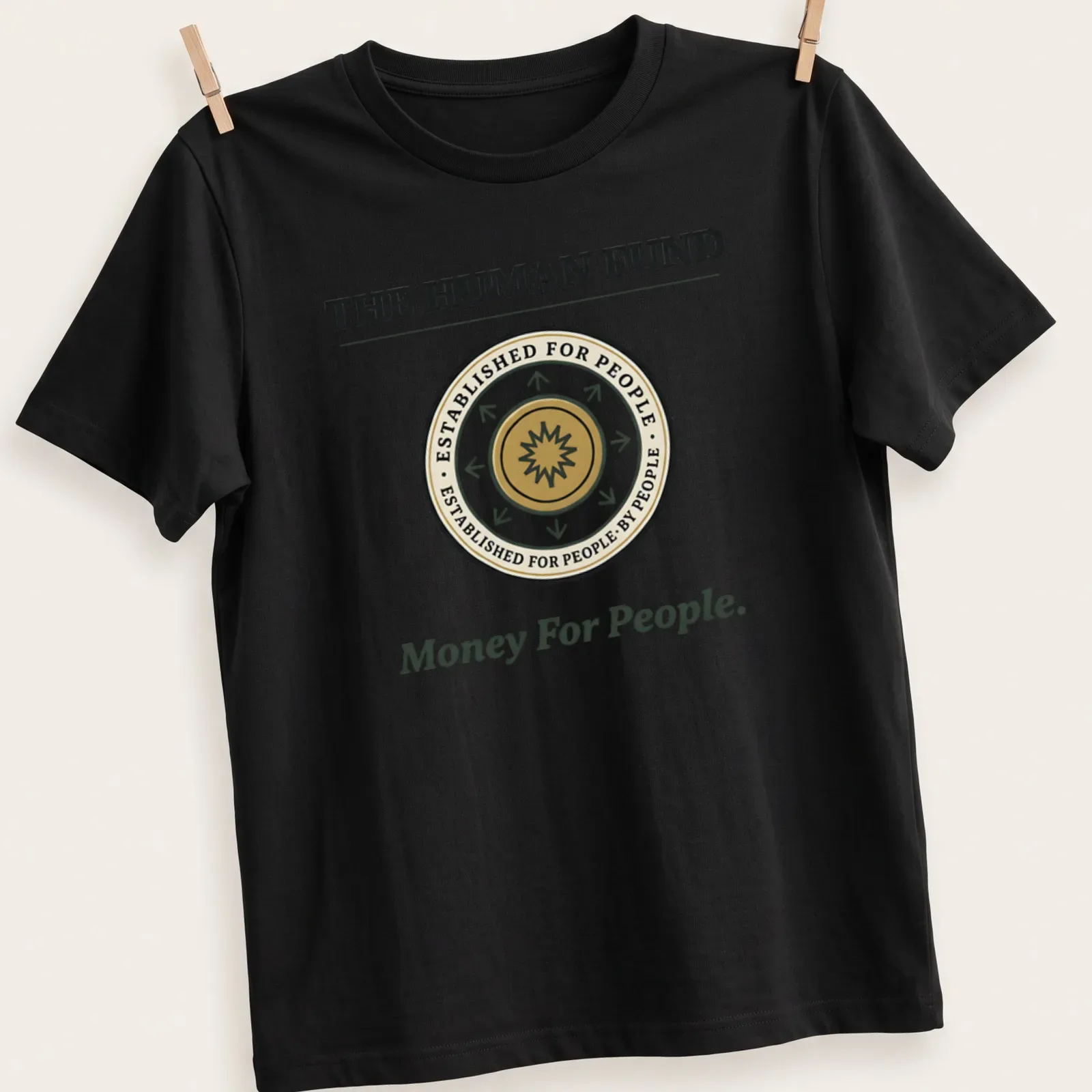 Emblem design with humorous text about the Human Fund in gold and green — printed on a unisex t-shirt