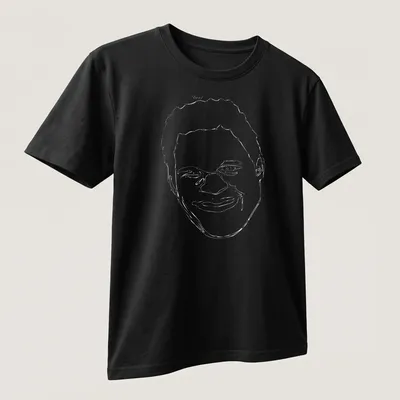 Bold graphic tee featuring Mark Kerr, The Smashing Machine in red, black, and white — printed on a unisex t-shirt (angled view)