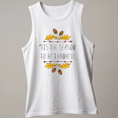 Hand-drawn illustration of autumn leaves and acorns with text 'TIS THE SEASON TO BE THANKFUL' — printed on a tank top