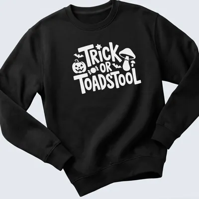Cartoon-style T-shirt featuring a whimsical toadstool and playful lettering — printed on a unisex sweatshirt