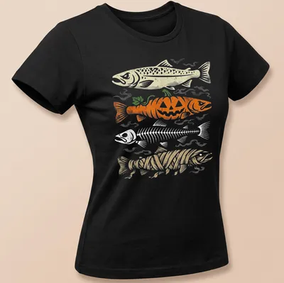 Vintage humor t-shirt with a trout skeleton beneath a pumpkin graphic — printed on a women's shirt