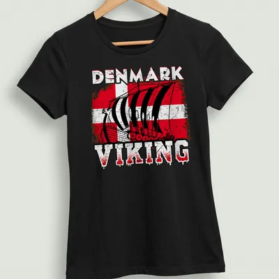 Distressed Viking ship graphic with Denmark flag colors and bold text — printed on a women's shirt