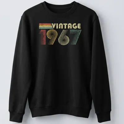 Vintage distressed t-shirt featuring 'VINTAGE 1967' in a retro font — printed on a unisex sweatshirt