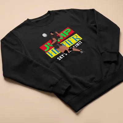 Bold graphic of a volleyball player jumping with motivational text in bright colors — printed on a unisex sweatshirt