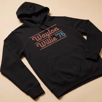 Vintage t-shirt featuring Waylon and Willie in a retro style with red, blue, and white colors — printed on a unisex hoodie