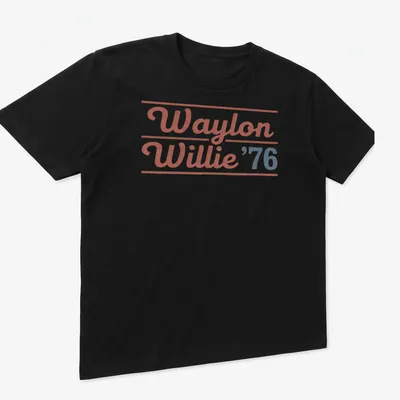 Vintage t-shirt featuring Waylon and Willie in a retro style with red, blue, and white colors — printed on a unisex t-shirt (angled view)