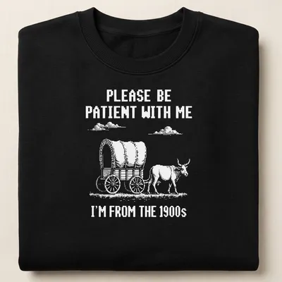 Vintage western design featuring a wagon with oxen and humorous text about patience — printed on a unisex sweatshirt