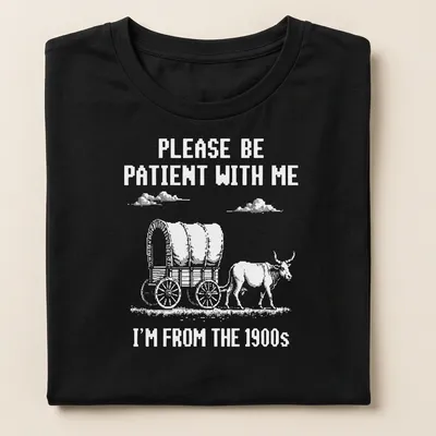 Vintage western design featuring a wagon with oxen and humorous text about patience — printed on a women's shirt