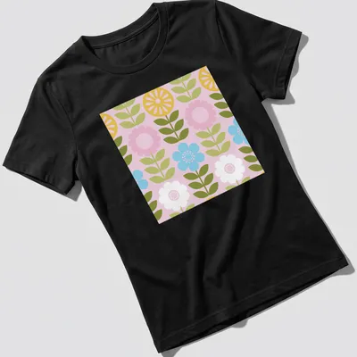 Illustration of wildflowers in pink, yellow, green, blue, and white in a mod Scandi style — printed on a women's shirt