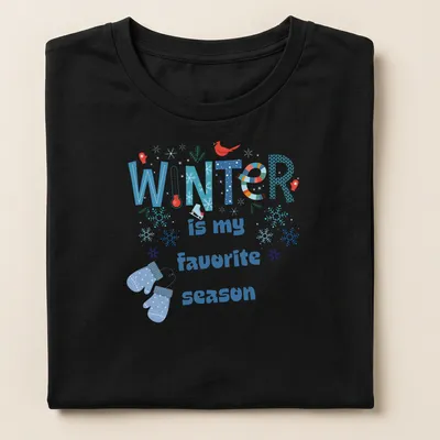 Colorful winter-themed T-shirt featuring snowflakes and mittens with the text 'WINTER is my favorite season' — printed on a women's shirt