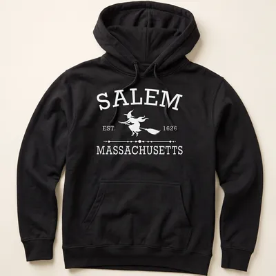 Vintage-style graphic of a witch with text 'Salem Massachusetts Est 1626' in white — printed on a unisex hoodie