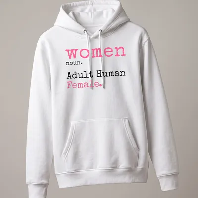 Playful typography t-shirt defining 'women noun. Adult Human Female.' in pink, black, and white. — printed on a unisex hoodie